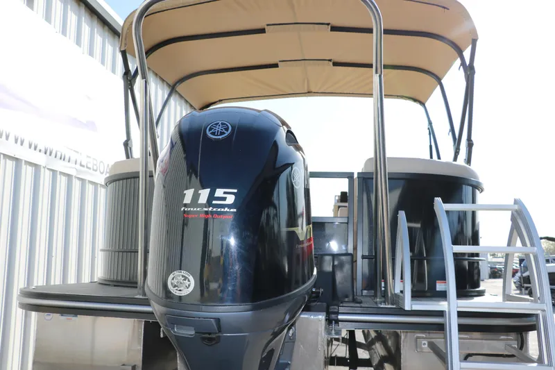 Slide: The Image of 2024 SunCatcher Select 320 RC pontoon boat with Yamaha 115 engine and canopy. - 5