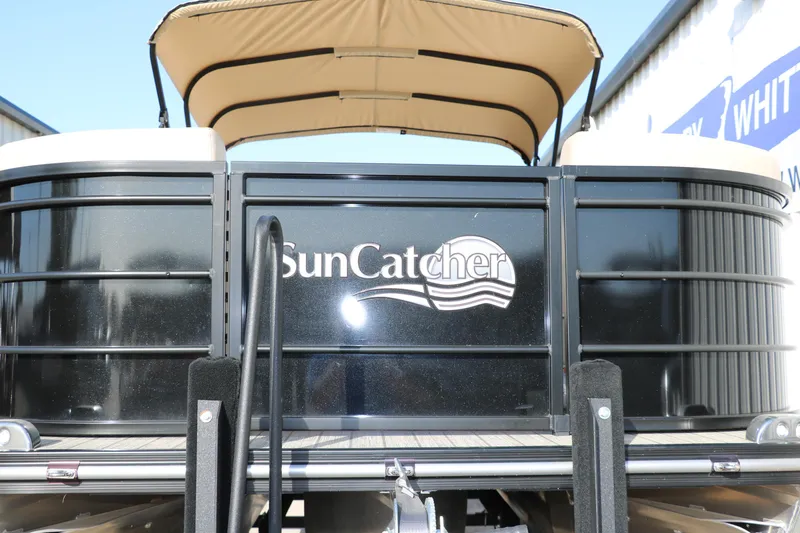 Slide: The Image of 2024 SunCatcher Select 320 RC pontoon boat with canopy, rear view. - 9