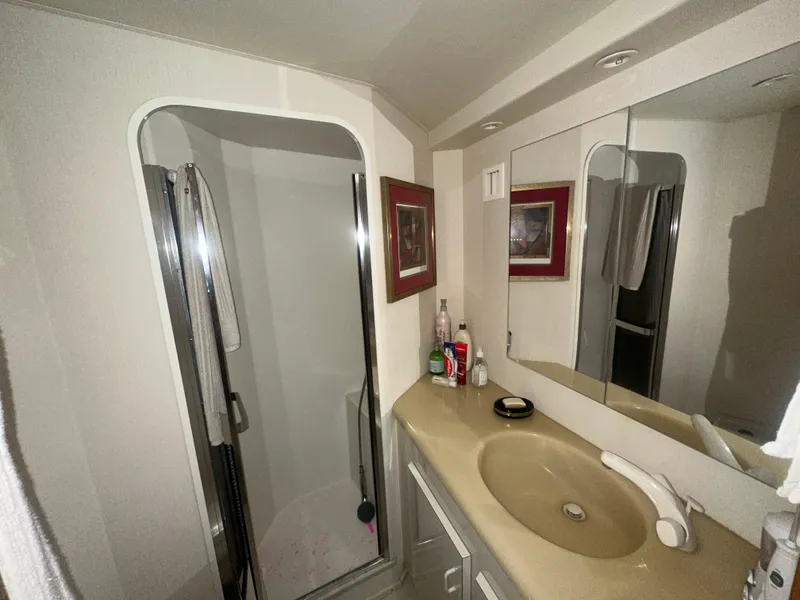 Slide: The Image of Bathroom interior of 1998 Viking 53 Convertible yacht with shower and sink. - 30