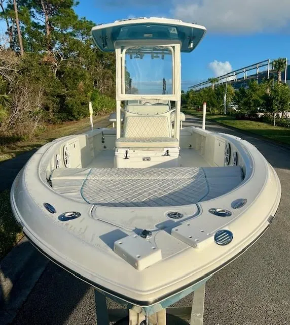 Slide: The Image of 2003 Hydra-Sports Bay Bolt 2300 boat with spacious deck and modern design. - 2