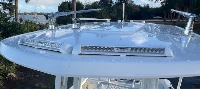 Slide: The Image of 2003 Hydra-Sports Bay Bolt 2300 boat roof with mounted LED lights and antennas. - 9