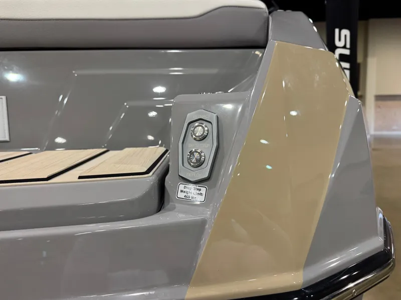 Slide: The Image of 2025 Supra SL boat rear detail with sleek design and modern lighting. - 11