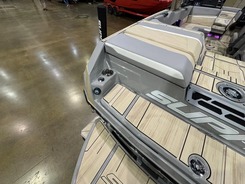 Slide: The Image of 2025 Supra SL boat interior with sleek design and comfortable seating. - 15