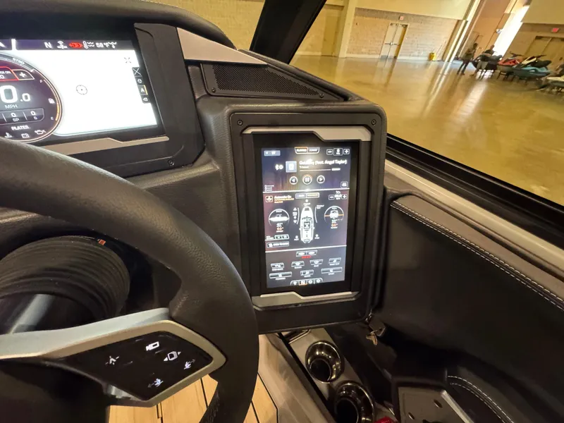 Slide: The Image of Interior dashboard of a 2025 Supra SL, featuring advanced digital displays and controls. - 28