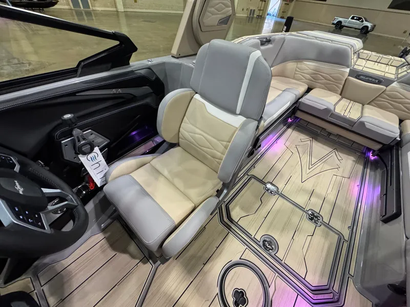 Slide: The Image of 2025 Supra SL boat interior with luxurious seating and modern design features. - 33