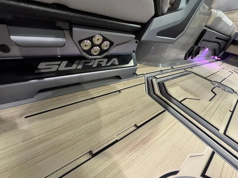 Slide: The Image of 2025 Supra SL interior with sleek design and modern flooring details. - 34