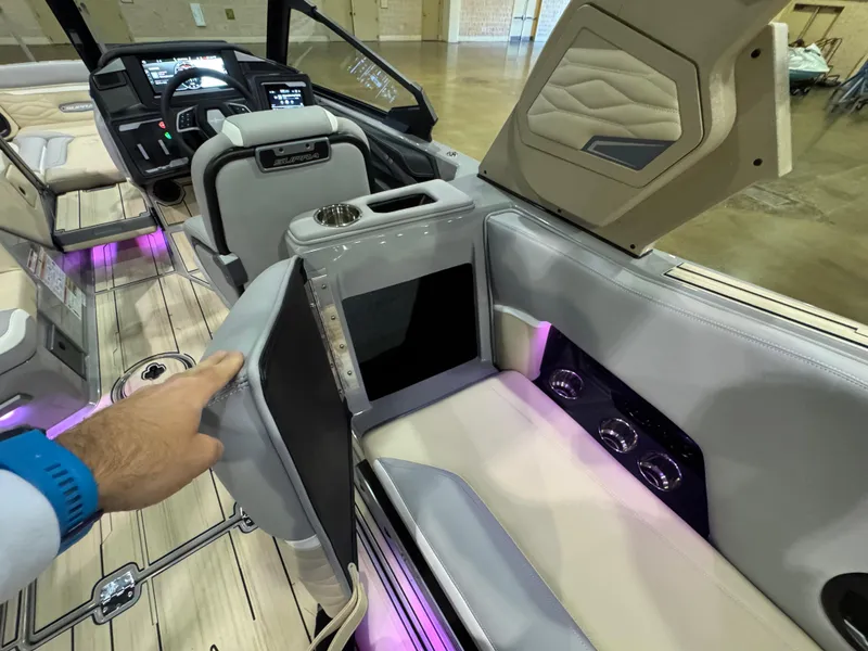 Slide: The Image of 2025 Supra SL boat interior with luxury seating and modern dashboard. - 36
