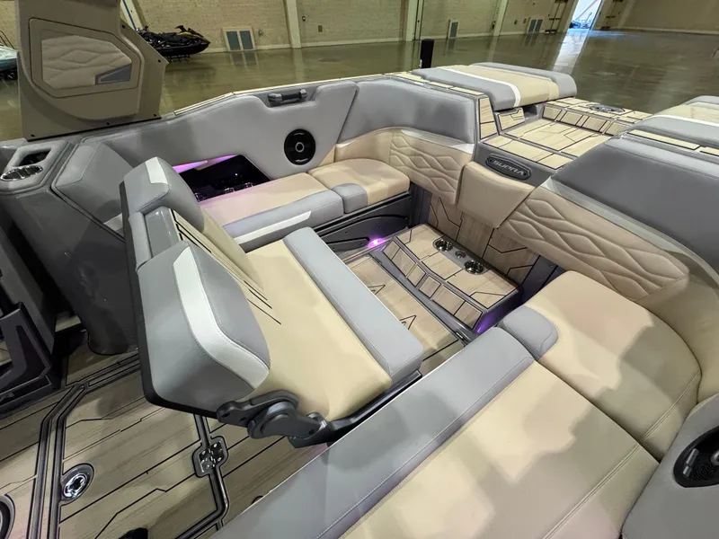 Slide: The Image of Luxurious interior of 2025 Supra SL boat with beige and gray seating. - 47