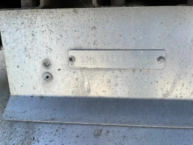 Slide: The Image of Metallic surface with engraved serial number on a 2006 SunChaser 820 4pt Fish boat. - 7