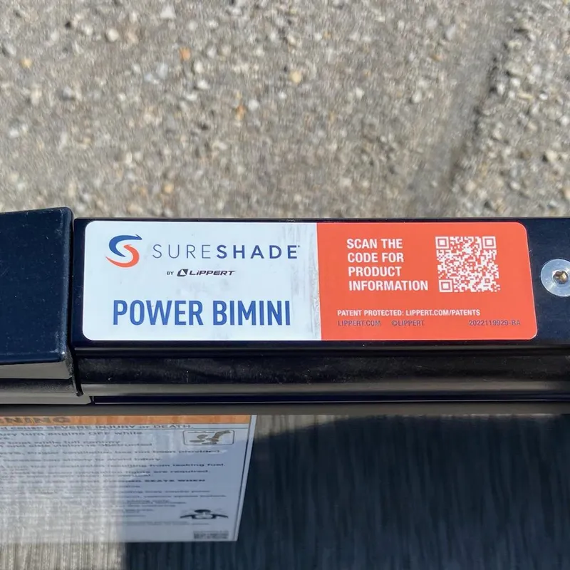 Slide: The Image of SureShade Power Bimini label with QR code on 2024 Godfrey Sweetwater SW2286SFL. - 8