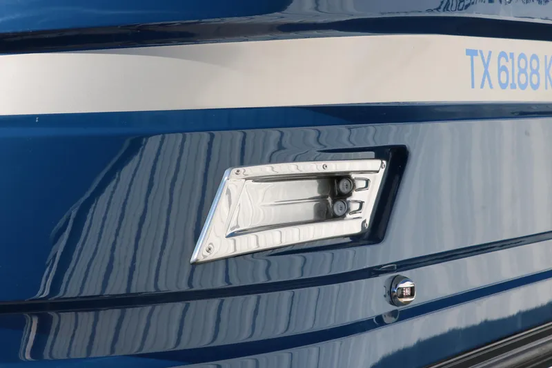 Slide: The Image of 2022 Silver Wave 2410 SW5 CLS boat detail with blue exterior and registration number. - 20