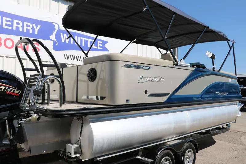 Slide: The Image of 2022 Silver Wave 2410 SW5 CLS pontoon boat with canopy on trailer. - 3