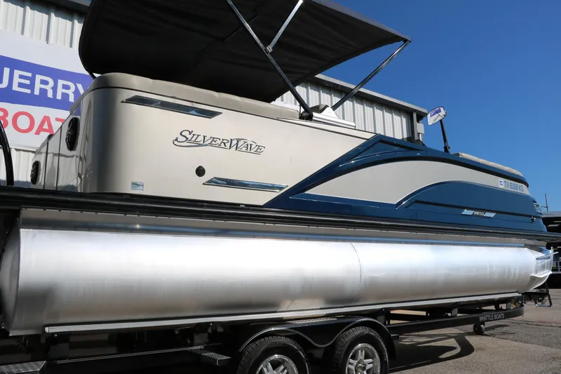 Slide: The Image of 2022 Silver Wave 2410 SW5 CLS pontoon boat on trailer, side view. - 7