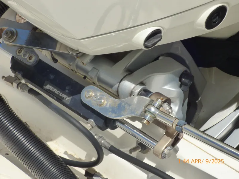 Slide: The Image of Boston Whaler 250 Outrage 2018 boat engine components with Mercury parts visible. - 49