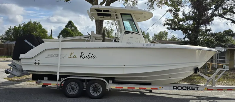 Slide: The Image of 2018 Boston Whaler 250 Outrage boat on trailer, side view. - 5