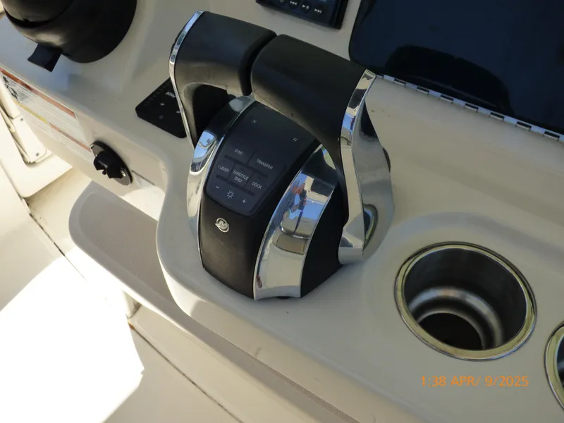 Slide: The Image of Throttle controls on a 2018 Boston Whaler 250 Outrage boat console. - 39