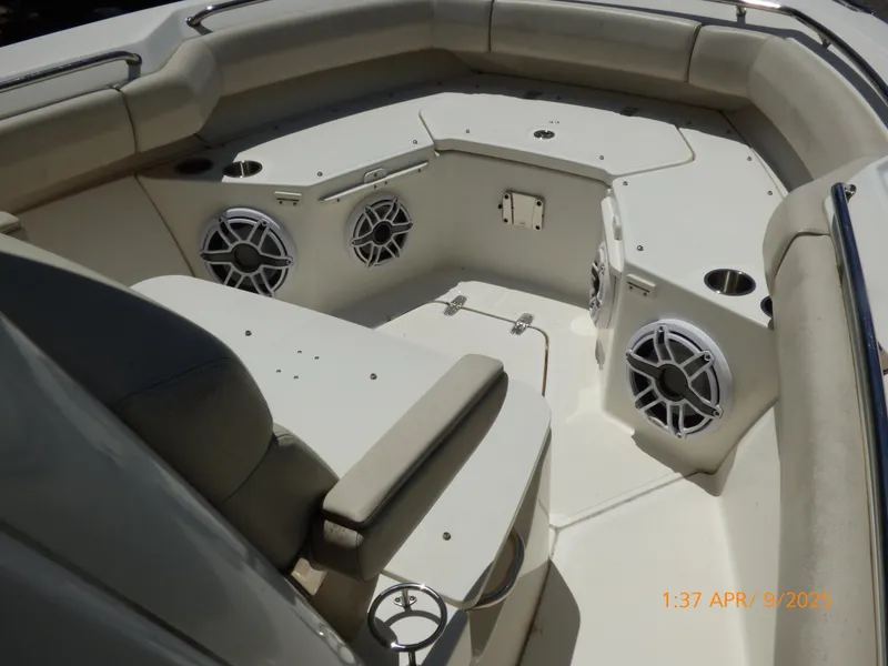 Slide: The Image of 2018 Boston Whaler 250 Outrage boat interior with seating and speakers. - 32