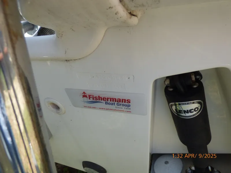 Slide: The Image of Boston Whaler 250 Outrage 2018 boat detail with Fishermans Boat Group sticker. - 18