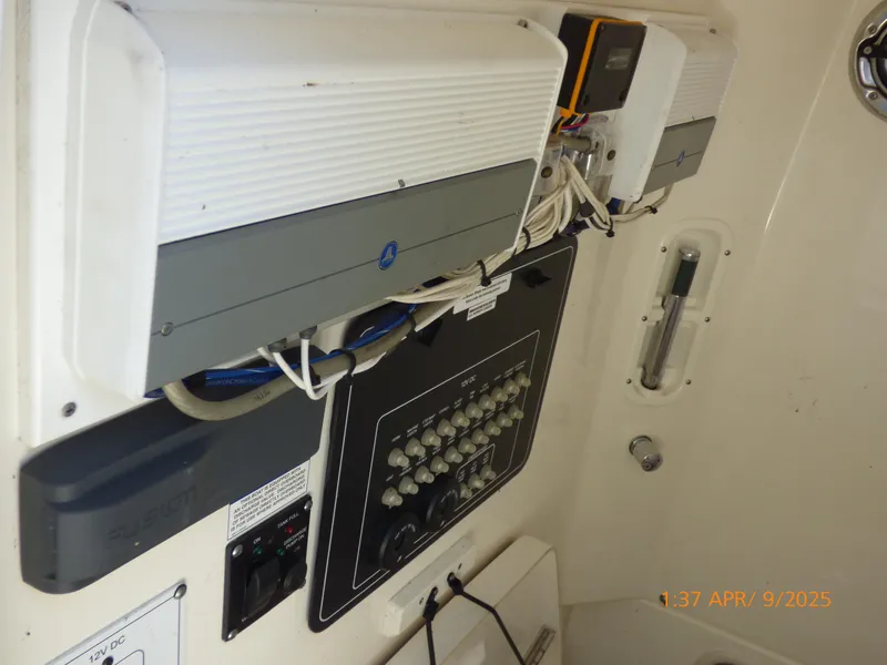 Slide: The Image of Electrical panel and wiring inside a 2018 Boston Whaler 250 Outrage boat. - 30