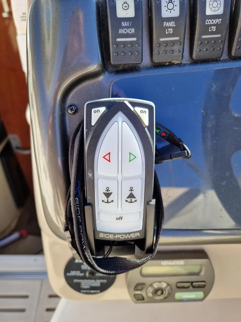Slide: The Image of Control panel of a 2006 Monterey 270 Cruiser boat with Side-Power thruster controls. - 36