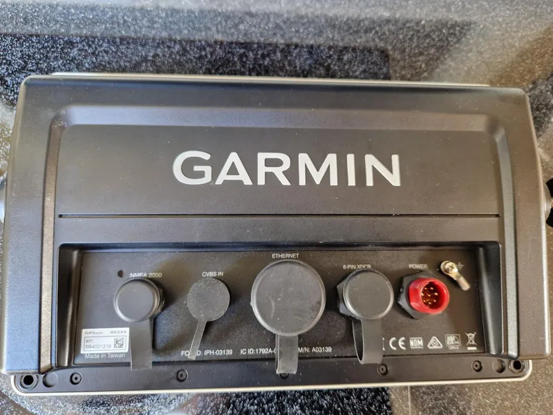 Slide: The Image of Garmin marine device on 2006 Monterey 270 Cruiser, showing various input and power connections. - 37