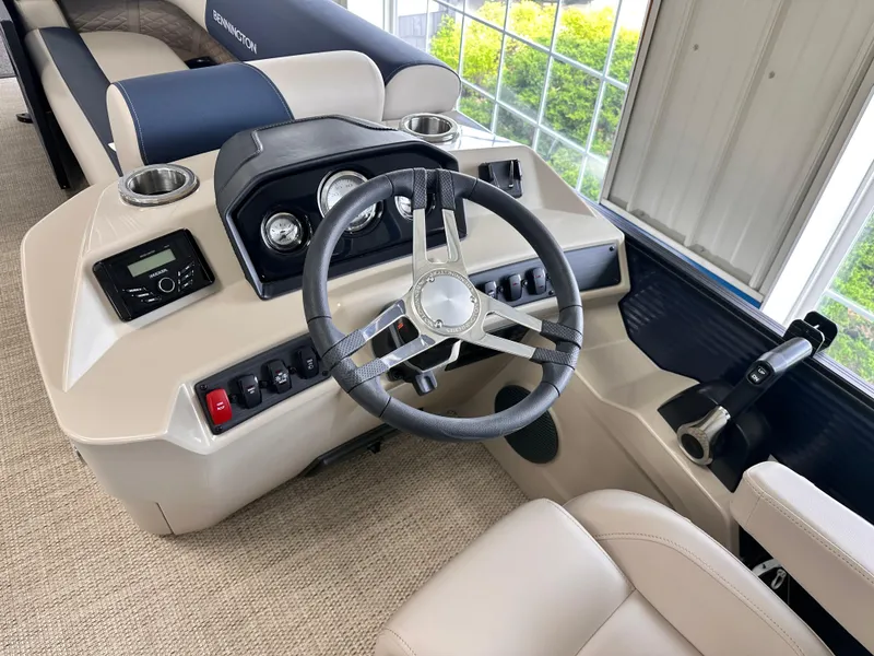 Slide: The Image of 2024 Bennington S Series 22 SSR boat dashboard with steering wheel and controls. - 8