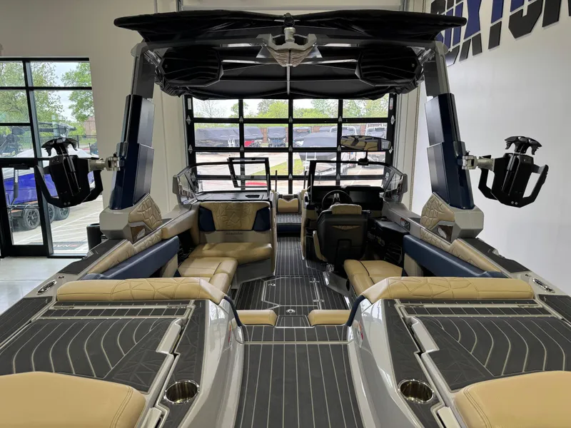 Slide: The Image of 2022 Nautique Super Air Nautique G23 Paragon interior with luxurious seating and advanced features. - 10