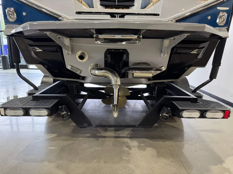 Slide: The Image of 2022 Nautique Super Air Nautique G23 Paragon boat stern and propeller detail. - 8