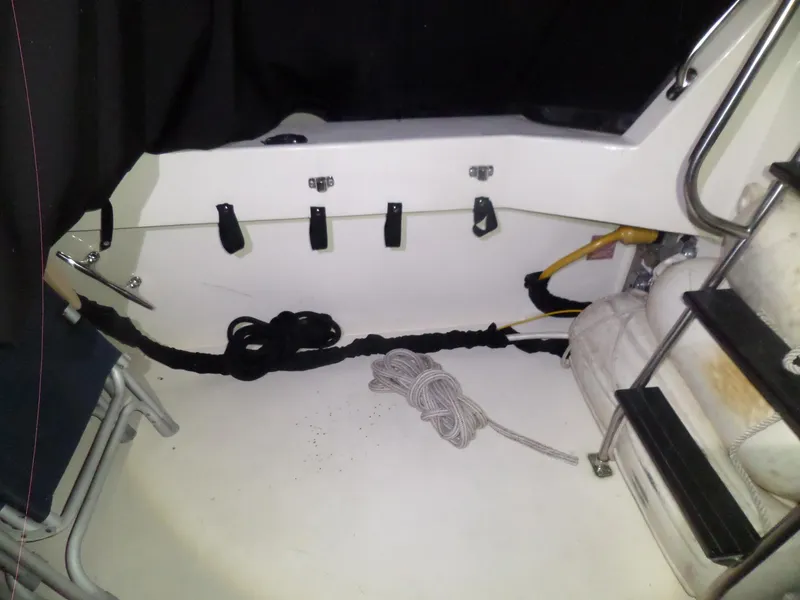 Slide: The Image of 1988 Hatteras 38 Convertible boat interior with ropes and ladder. - 42