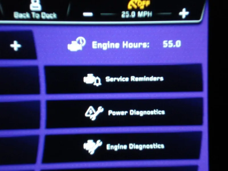 Slide: The Image of Dashboard of 2023 Nautique Super Air Nautique GS22 showing engine hours and diagnostics. - 10