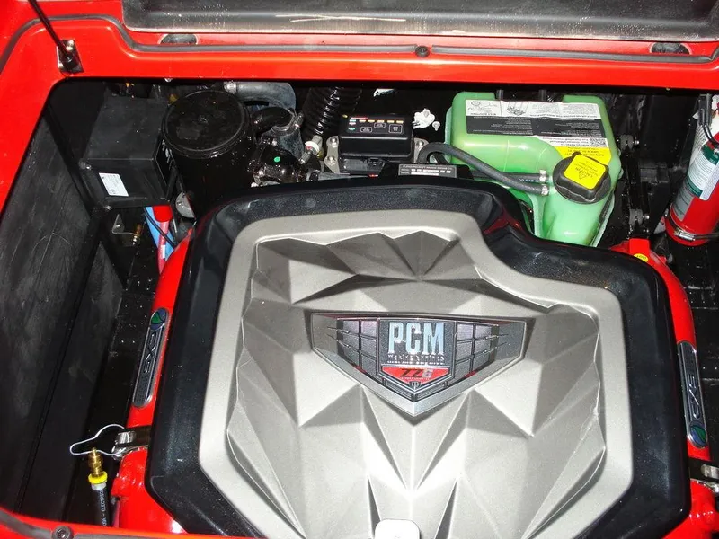 Slide: The Image of Engine compartment of 2023 Nautique Super Air Nautique GS22 with PCM engine cover. - 8