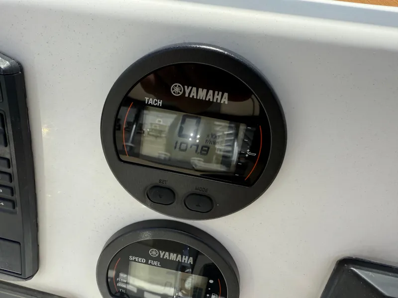 Slide: The Image of Yamaha tachometer and speed fuel gauges on 2022 Tidewater 1910 Bay Max boat. - 11