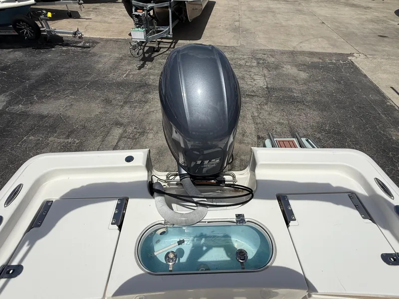 Slide: The Image of 2022 Tidewater 1910 Bay Max boat with outboard motor and livewell. - 15