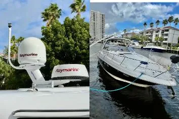 Slide: The Image of 2007 Regal Commodore 3760 IB yacht with Raymarine equipment, docked near palm trees and buildings. - 21