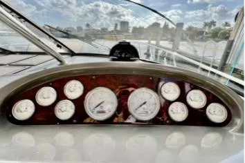 Slide: The Image of Dashboard of 2007 Regal Commodore 3760 IB boat with gauges and controls. - 4