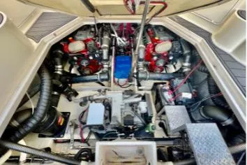 Slide: The Image of Engine compartment of a 2007 Regal Commodore 3760 IB with dual red engines. - 8