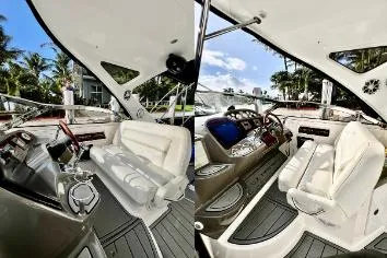 Slide: The Image of 2007 Regal Commodore 3760 IB yacht interior with plush seating and modern dashboard. - 9