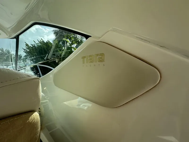 Slide: The Image of 2008 Tiara Yachts 3500 Sovran interior with logo detail and window view. - 12