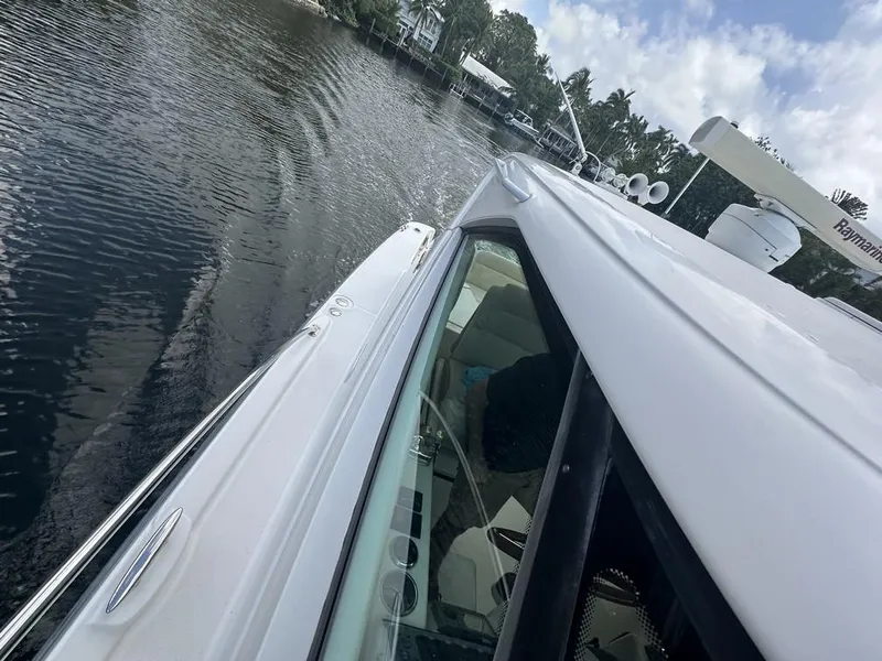 Slide: The Image of 2008 Tiara Yachts 3500 Sovran cruising on a calm waterway. - 42