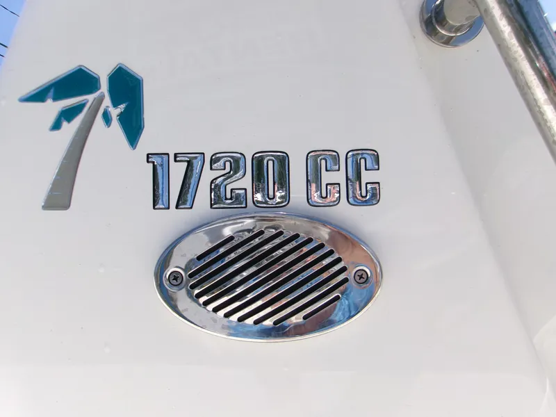 Slide: The Image of Key West 1720 CC boat emblem with chrome vent, 2025 model. - 15