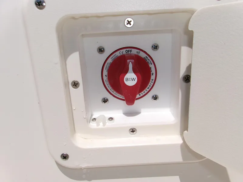 Slide: The Image of Battery switch on a 2025 Key West 1720 boat, featuring a red and white dial. - 7