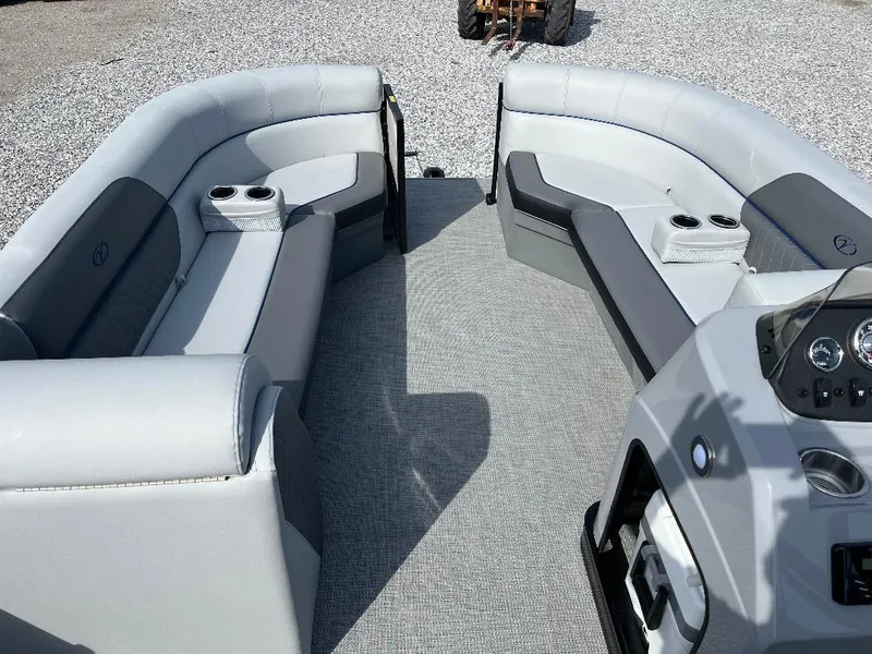 Slide: The Image of 2025 Veranda VS22RC pontoon boat interior with gray seating and cup holders. - 7