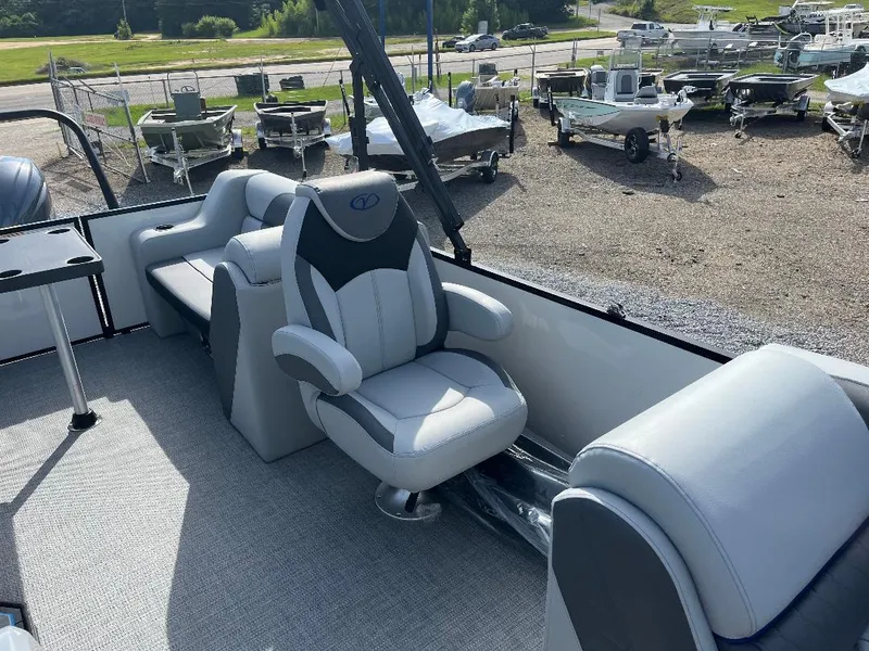 Slide: The Image of 2025 Veranda VS22RC pontoon boat interior with plush seating and modern design. - 8