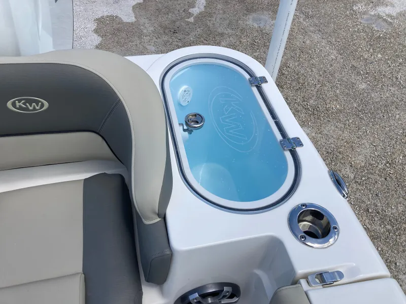 Slide: The Image of 2025 Key West 291FS boat seating and livewell with cup holders. - 23