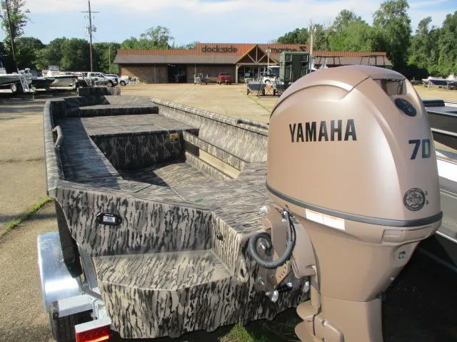 Slide: The Image of 2025 Reaper Boats 756-1381 with Yamaha 70 engine, dockside view. - 6