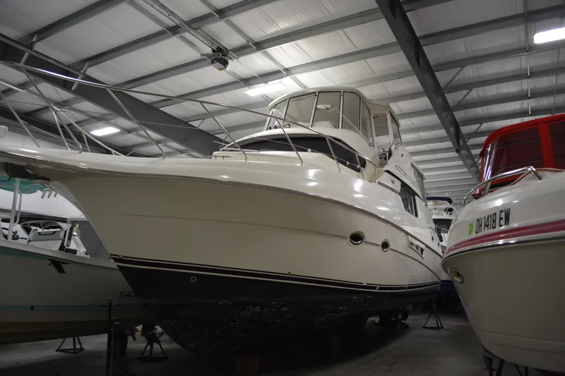 Slide: The Image of 2001 Silverton 453 Motor Yacht in indoor storage facility. - 2