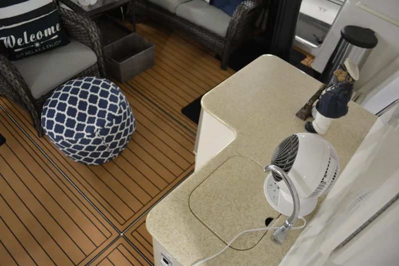 Slide: The Image of Interior of 2001 Silverton 453 Motor Yacht with seating and nautical decor. - 27