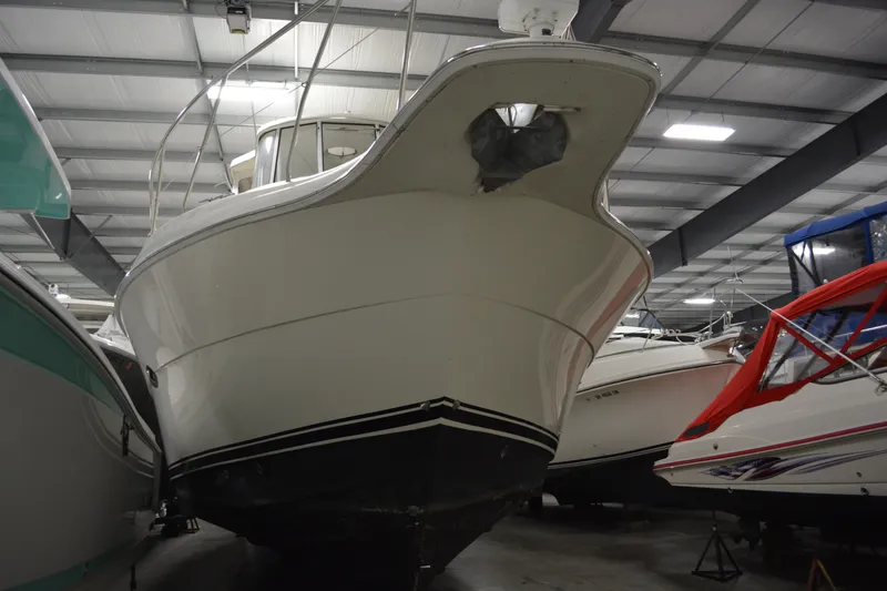 Slide: The Image of 2001 Silverton 453 Motor Yacht in indoor storage, front view. - 3
