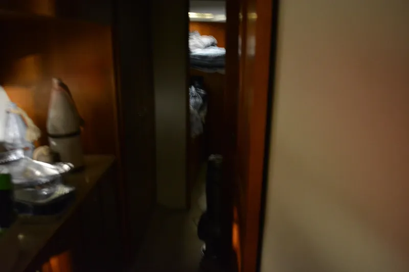 Slide: The Image of Dimly lit interior hallway of a 2001 Silverton 453 Motor Yacht. - 50
