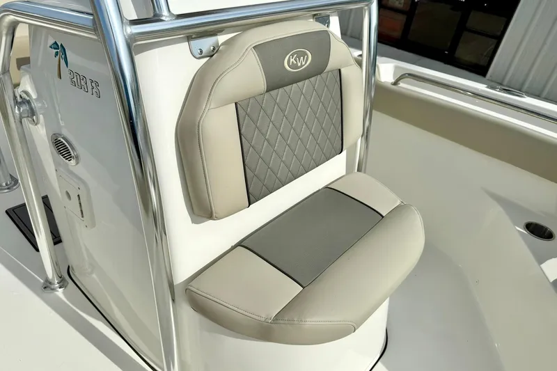 Slide: The Image of 2025 Key West 203 FS boat seat with gray and beige cushioned design. - 18